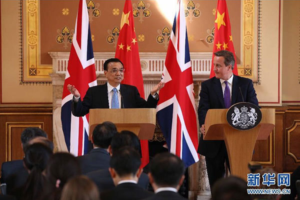     6月17日，國務院總理李克強同英國首相卡梅倫在倫敦舉行中英總理年度會晤后共同會見記者。 新華社記者 龐興雷 攝 