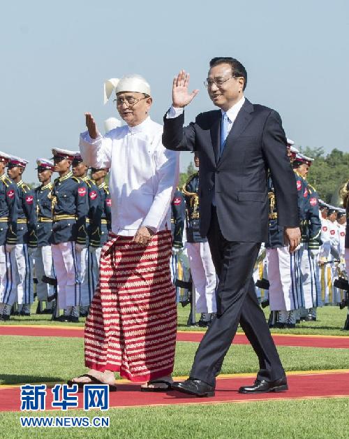 11月14日，中國國務院總理李克強在內比都同緬甸總統吳登盛舉行會談。這是會談前，吳登盛在緬甸總統府前廣場為李克強舉行隆重的歡迎儀式。新華社記者 王曄 攝